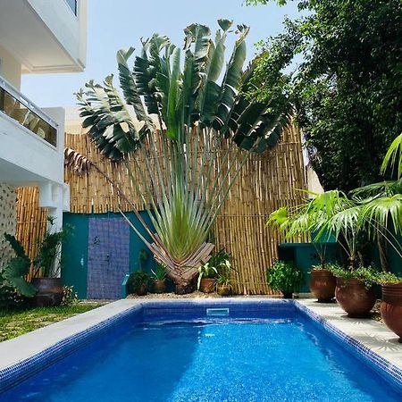 L'Oasis Guesthouse Котону Экстерьер фото