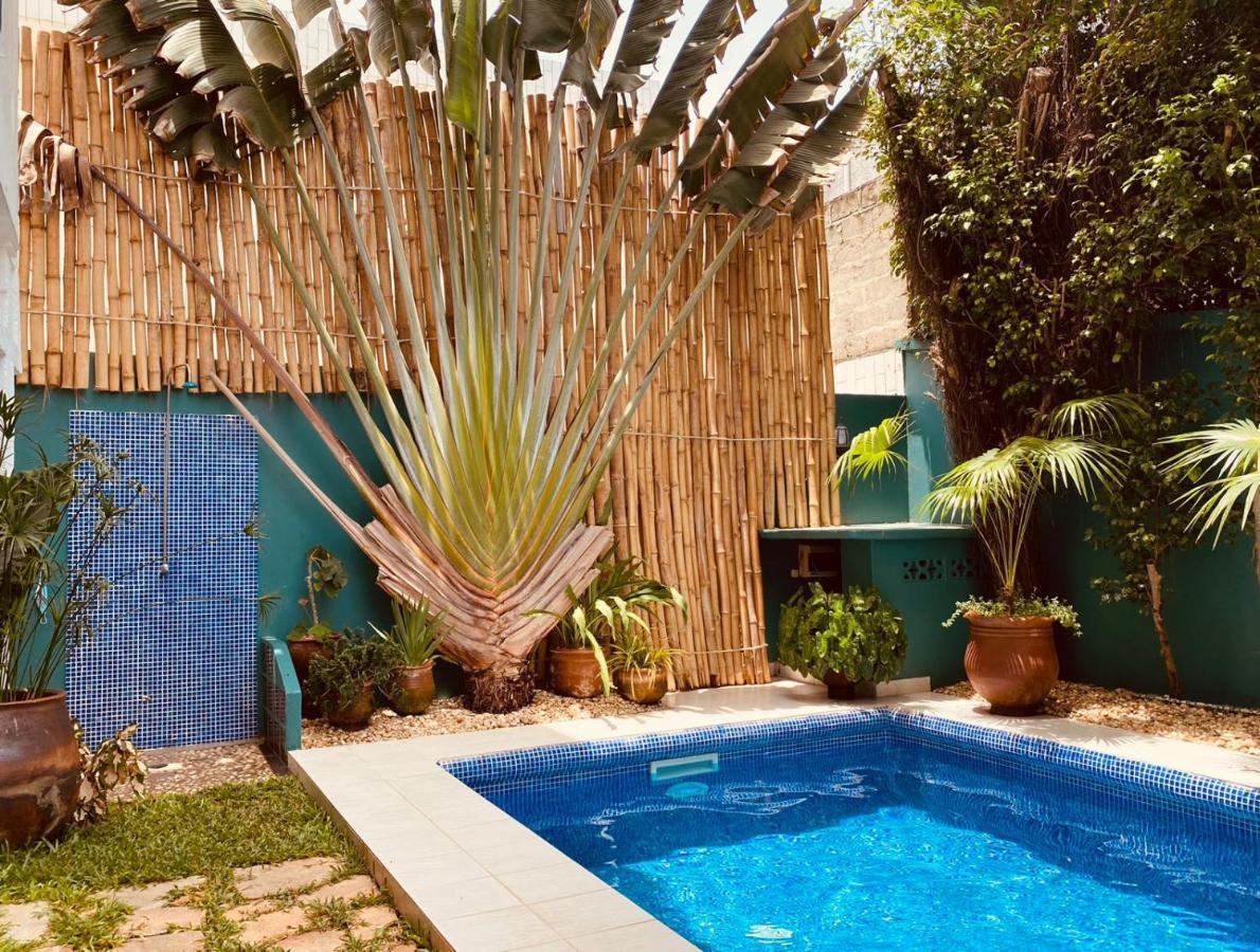 L'Oasis Guesthouse Котону Экстерьер фото