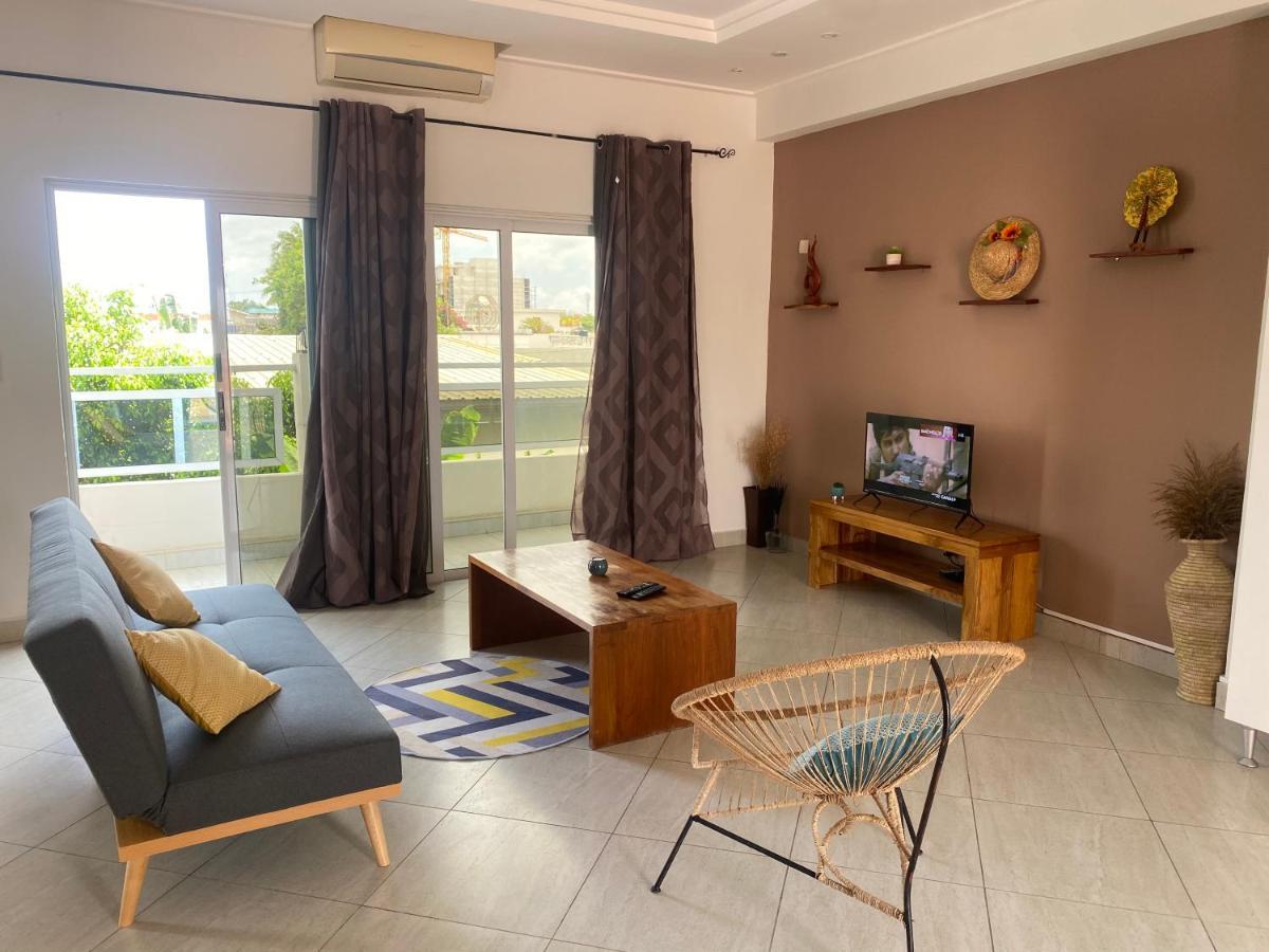 L'Oasis Guesthouse Котону Экстерьер фото