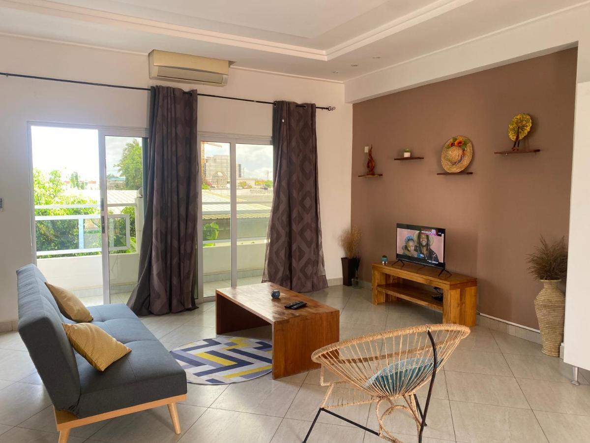L'Oasis Guesthouse Котону Экстерьер фото