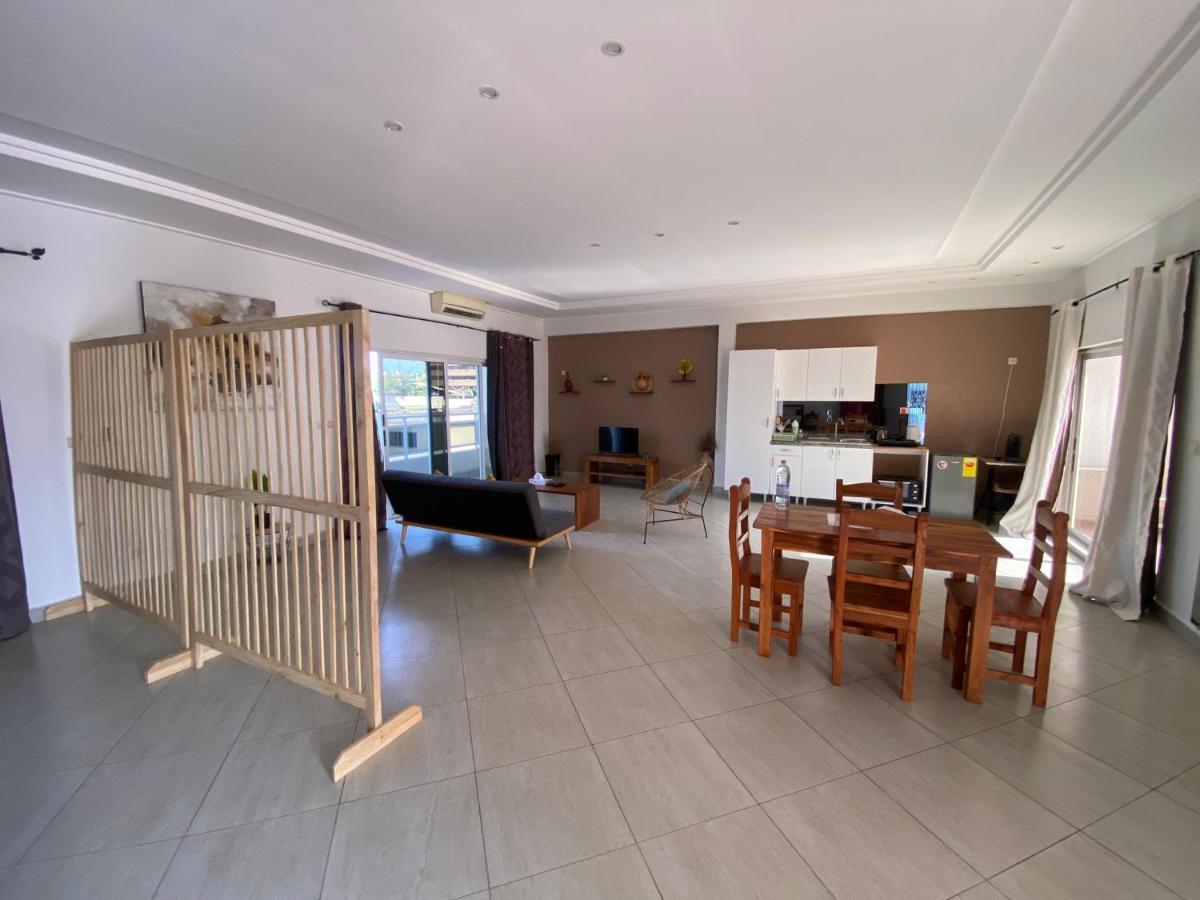 L'Oasis Guesthouse Котону Экстерьер фото