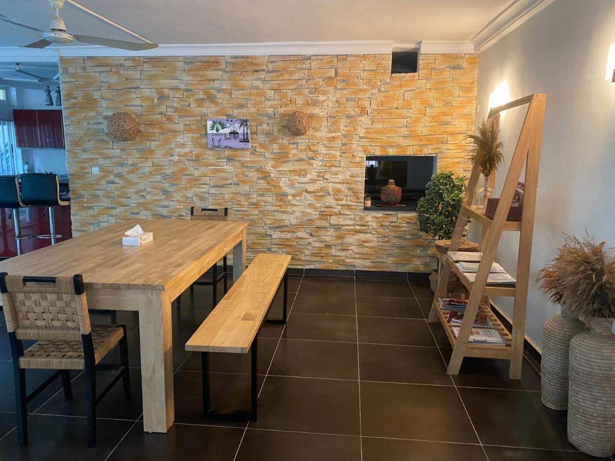 L'Oasis Guesthouse Котону Экстерьер фото