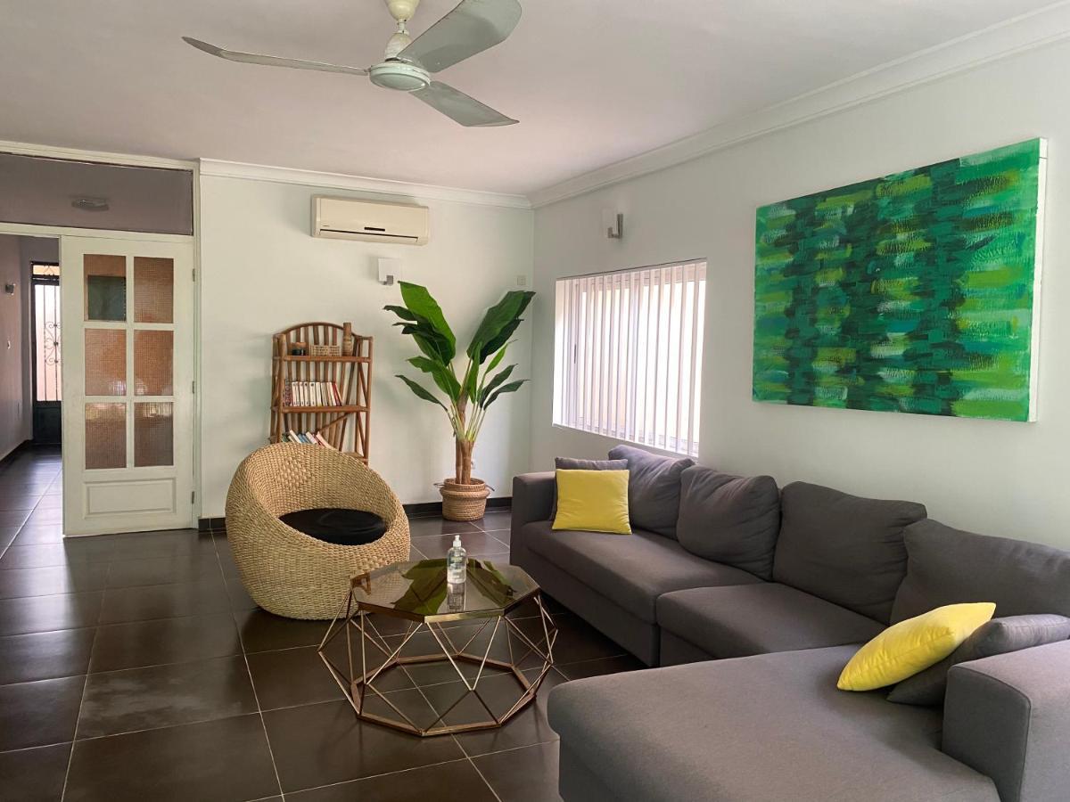 L'Oasis Guesthouse Котону Экстерьер фото