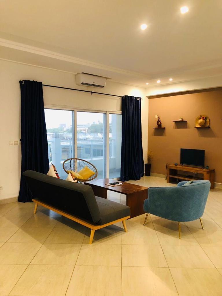 L'Oasis Guesthouse Котону Экстерьер фото