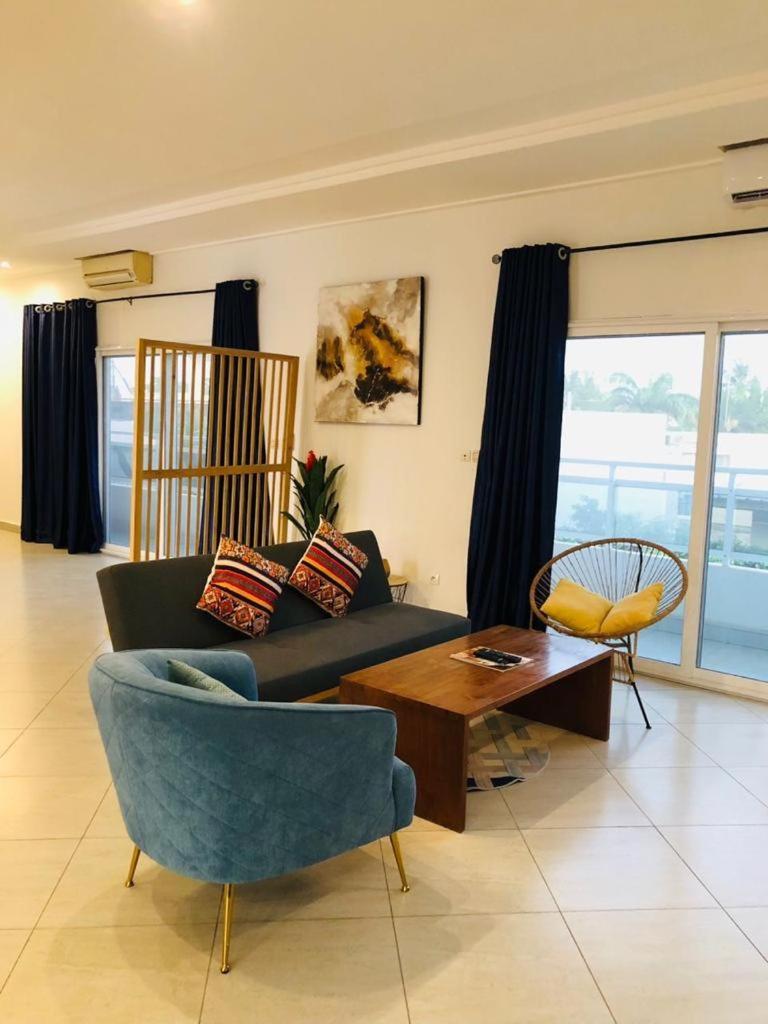 L'Oasis Guesthouse Котону Экстерьер фото