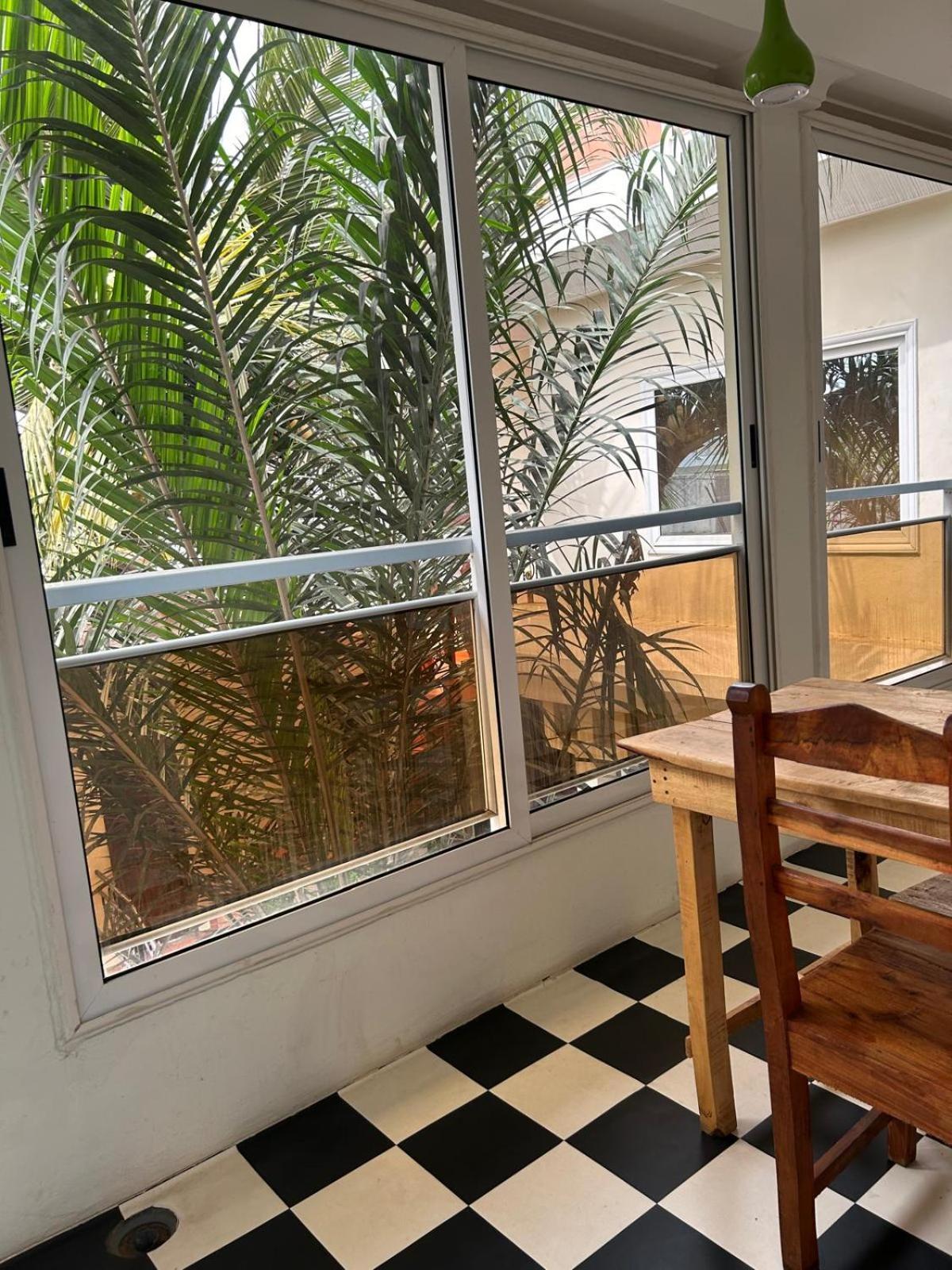 L'Oasis Guesthouse Котону Экстерьер фото