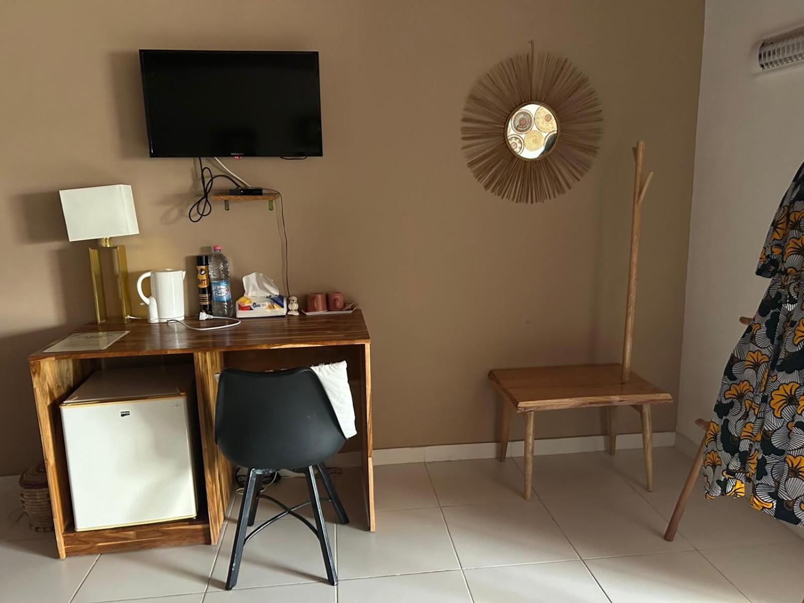 L'Oasis Guesthouse Котону Экстерьер фото